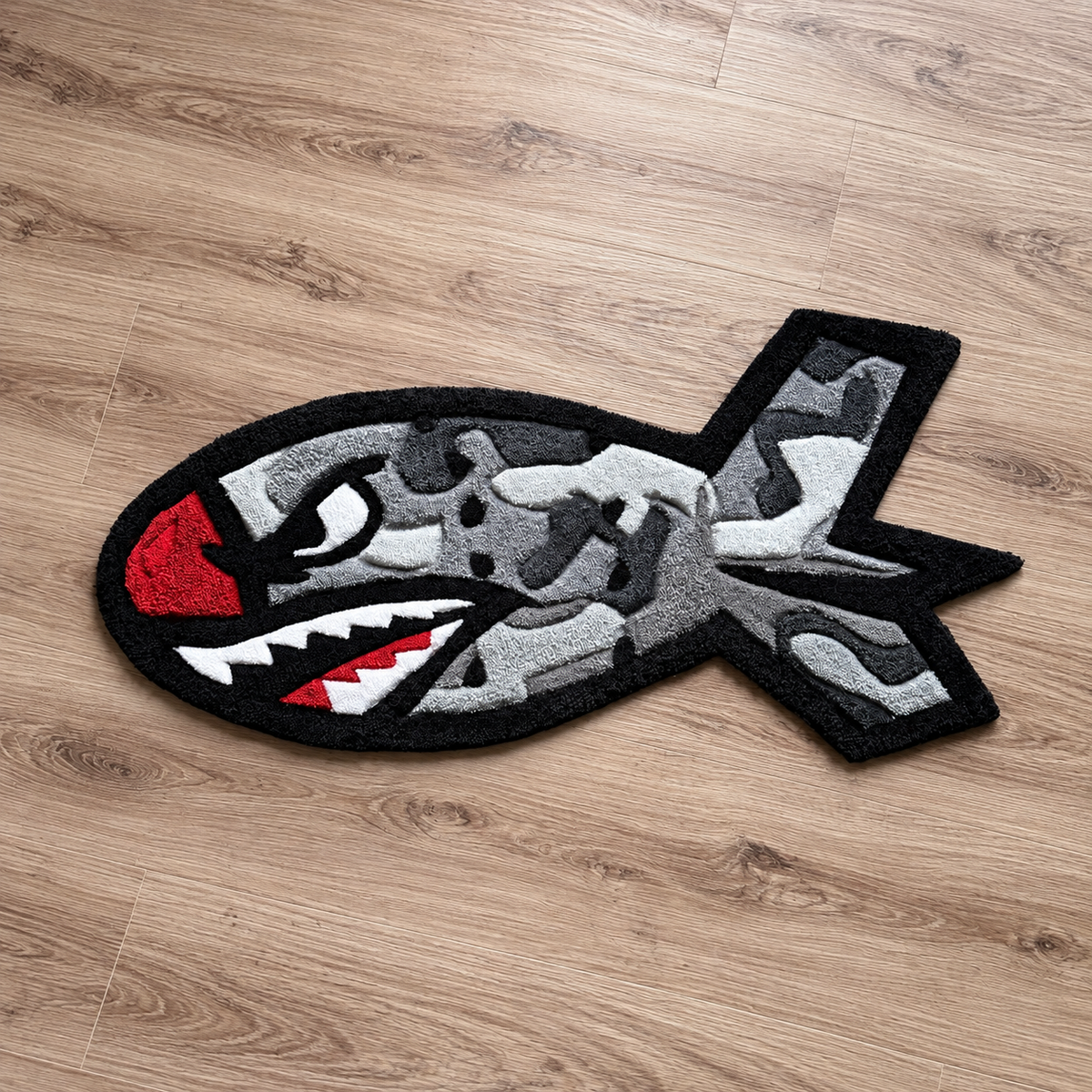 Camo Shark Bomb rug photographed on hardwood from the front, AI-cleaned background