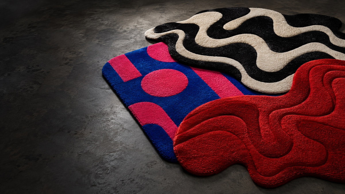 Three handmade custom tufted rugs