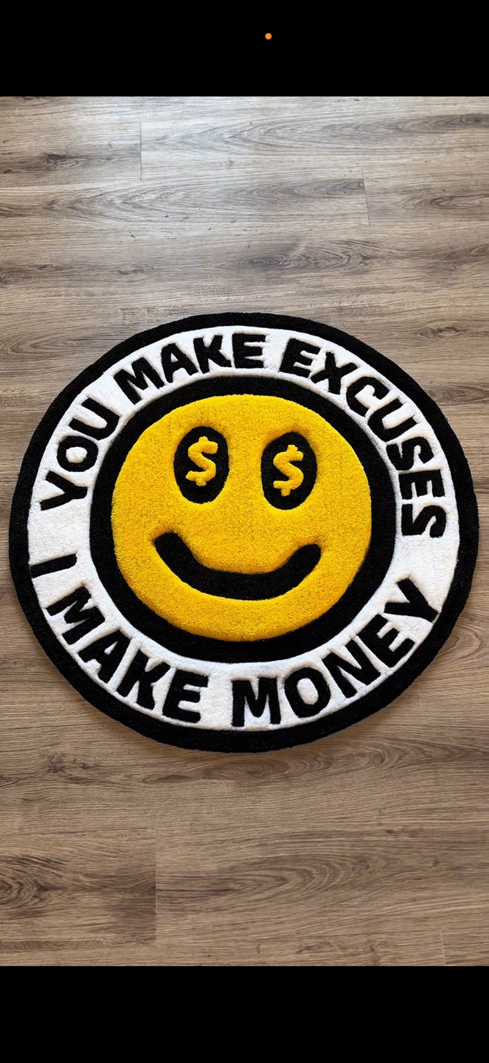 Overhead view of the round yellow, black and white I Make Money smiley rug.